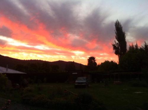 Amanecer o atardecer desde la casa vacacional o alrededores