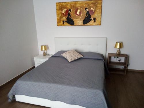 Posteľ alebo postele v izbe v ubytovaní B&B del Capo