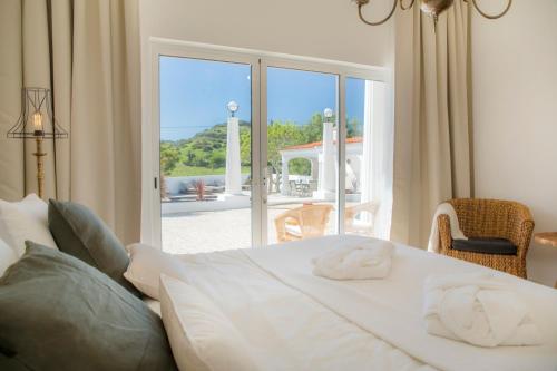 Postel nebo postele na pokoji v ubytování Casa Luisandra Boutique Hotel B&B