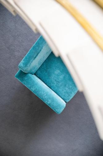 a close up of a turquoise pencil at Hotel Black Tulip - Porto Gaia in Vila Nova de Gaia