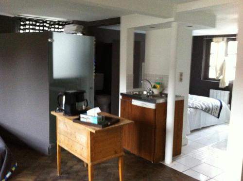 Köök või kööginurk majutusasutuses Appartements Au-Dessus Du...