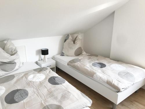 Ένα ή περισσότερα κρεβάτια σε δωμάτιο στο Zollernalb-Apartment