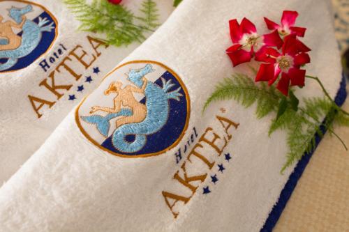 a close up of a napkin with a dragon on it at Hotel Aktea in Lipari