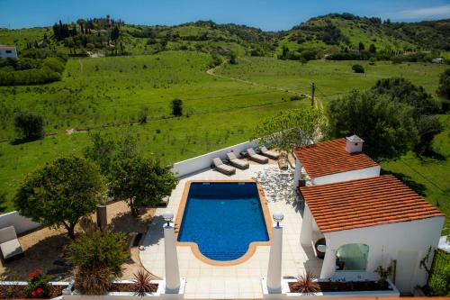 an aerial view of a villa with a swimming pool at Casa Luisandra Boutique Hotel B&B in Luz