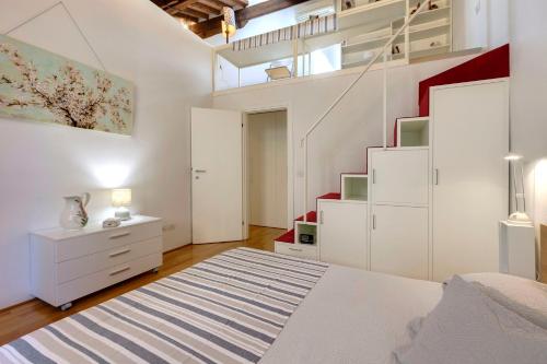 מיטה או מיטות בחדר ב-Finardi Apartment