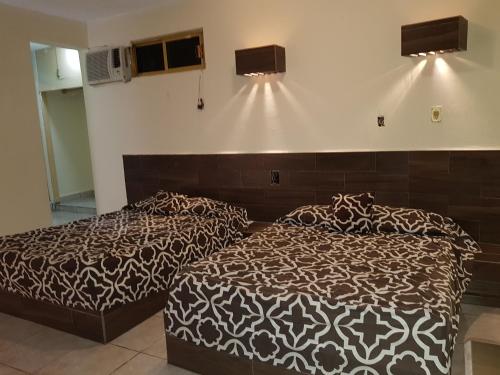 Postel nebo postele na pokoji v ubytování Costa Miramar