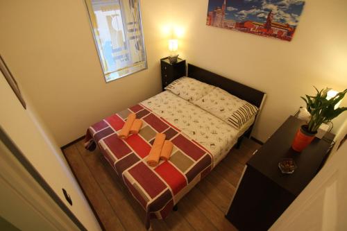 Ένα ή περισσότερα κρεβάτια σε δωμάτιο στο Zadar Center Apartment