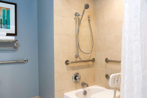 a bathroom with a shower and a sink at Hyatt Place Sarasota/Bradenton in Sarasota