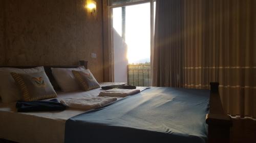 Ein Bett oder Betten in einem Zimmer der Unterkunft Ella Nature Life Guest & Restaurant -Free Pickup from Ella