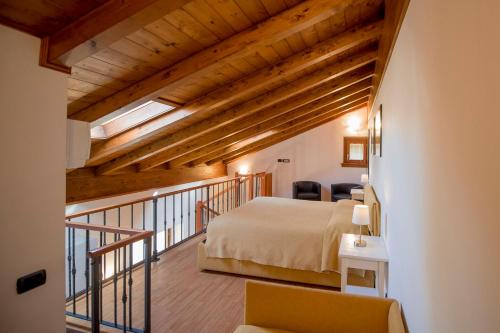 A bed or beds in a room at Il Borgo