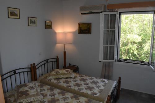 Ένα ή περισσότερα κρεβάτια σε δωμάτιο στο Starvillas Apartments and Studios