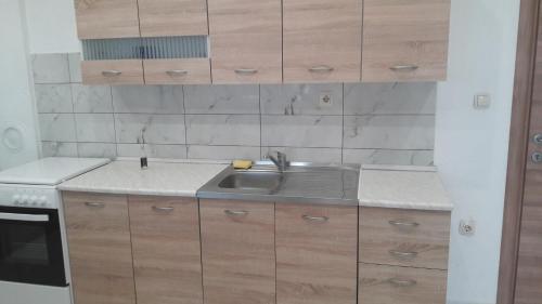 Kuchyňa alebo kuchynka v ubytovaní Apartment Matej