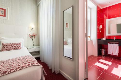 Кровать или кровати в номере Hotel Florescente