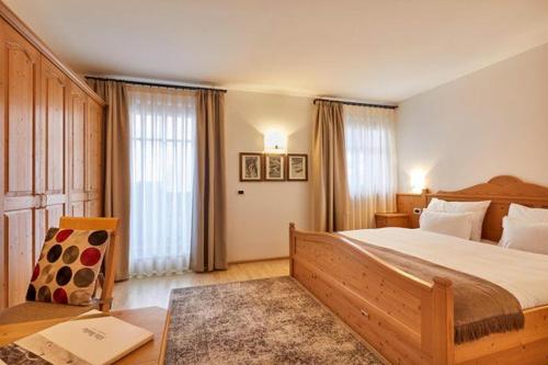 Letto o letti in una camera di Ciasa Verena