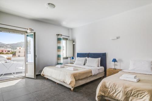 Katil atau katil-katil dalam bilik di Santorini Blue Senses Villas