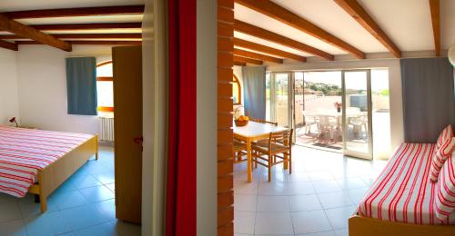 Ένα ή περισσότερα κρεβάτια σε δωμάτιο στο Residence Pian Dei Boschi