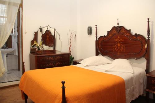Säng eller sängar i ett rum på Monte Sinai Guest House