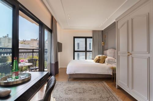 Una cama o camas en una habitación de Hotel Jacob Samuel by Prima Hotels