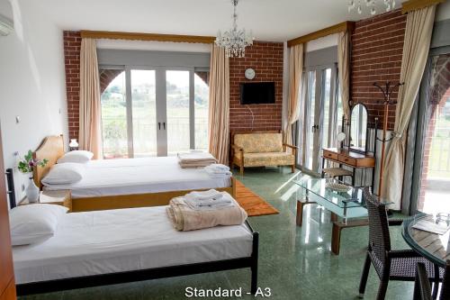 Katil atau katil-katil dalam bilik di Ionion Star Hotel