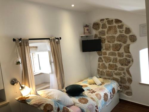 Posteľ alebo postele v izbe v ubytovaní Elegant Apartment Leila