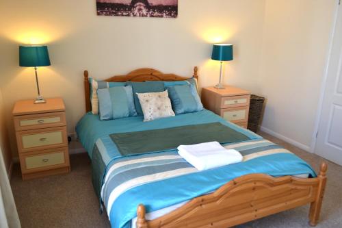 Säng eller sängar i ett rum på Seam Terrace - Home from Home