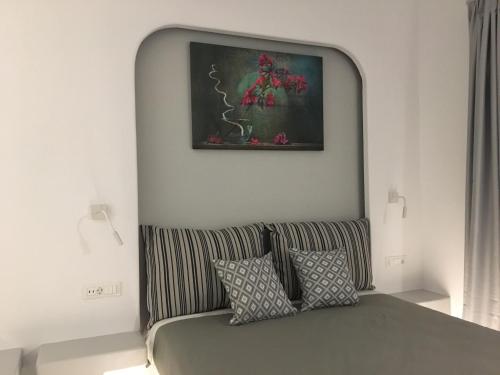 Postel nebo postele na pokoji v ubytování Mina Studios