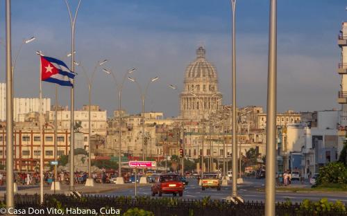 a view of a city with a flag and a building at Casa Don Vito in Havana