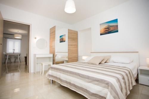 Ένα ή περισσότερα κρεβάτια σε δωμάτιο στο Apartment Bilo
