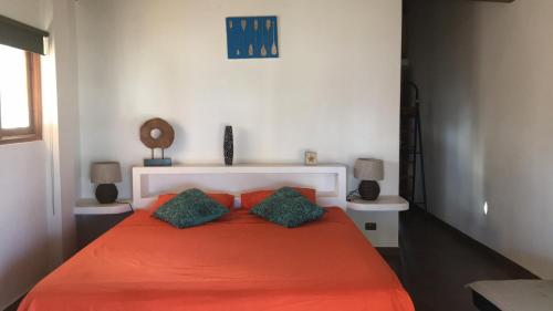 Postel nebo postele na pokoji v ubytování Casa BlueSky