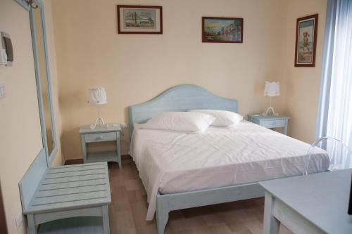 Postel nebo postele na pokoji v ubytování L'Antico Monastero