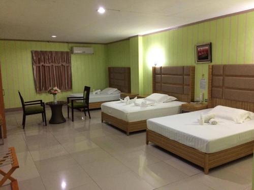 Ένα ή περισσότερα κρεβάτια σε δωμάτιο στο Asia Novo Boutique Hotel - Oroquieta