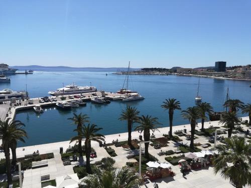 a view of a harbor with boats in the water at Riva Apartments in Split