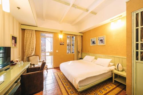 Ένα ή περισσότερα κρεβάτια σε δωμάτιο στο Templers House Boutique hotel