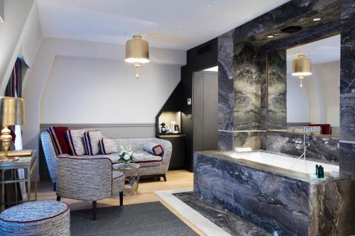 Χώρος καθιστικού στο Hotel Lumen Paris Louvre