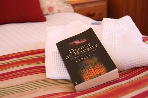 Ένα ή περισσότερα κρεβάτια σε δωμάτιο στο Mandeley Guest House