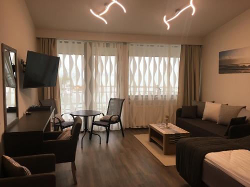 Galería fotográfica de Calypso Lakeside Rooms & Lux Apartments en Siófok