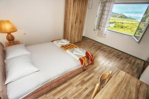 Ένα ή περισσότερα κρεβάτια σε δωμάτιο στο Apartments Lake View
