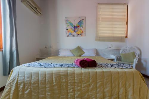 Katil atau katil-katil dalam bilik di Residence Villas Mont Choisy