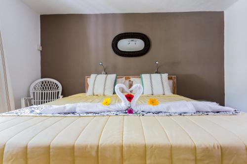 Katil atau katil-katil dalam bilik di Residence Villas Mont Choisy