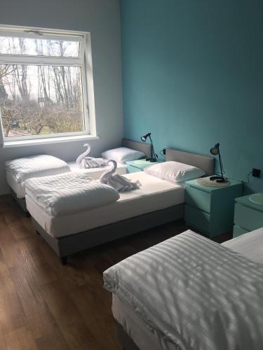 Postel nebo postele na pokoji v ubytování Hotel Kamil