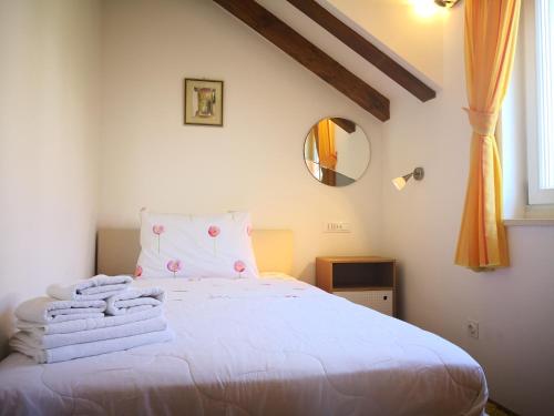 A bed or beds in a room at Apartment Maria Di