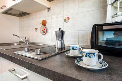 Kjøkken eller kjøkkenkrok på RM Apartments