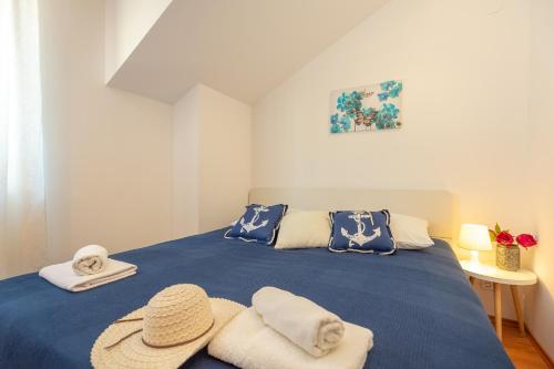 Ein Bett oder Betten in einem Zimmer der Unterkunft Apartments Mondo