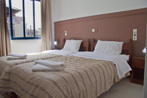 Danaos Hotelにあるベッド
