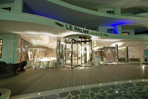 a store with a dance floor in a building at Hotel Le Palme - Premier Resort in Milano Marittima