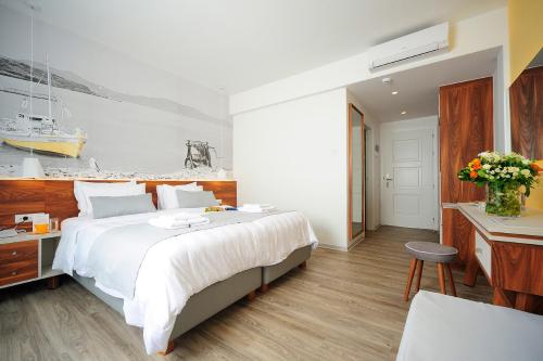 Ένα ή περισσότερα κρεβάτια σε δωμάτιο στο Atrium Ambiance Hotel