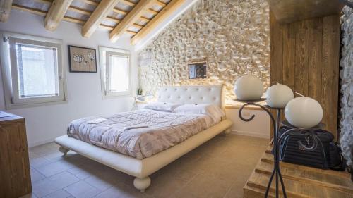 Postel nebo postele na pokoji v ubytování B&B Agli Angeli