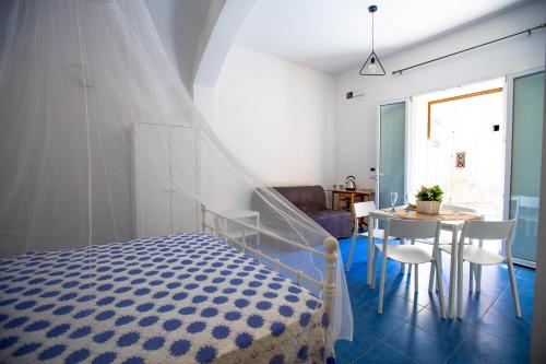Ένα ή περισσότερα κρεβάτια σε δωμάτιο στο Sciabika Home - Edificio Egadi