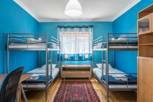 Poschodová posteľ alebo postele v izbe v ubytovaní Casa das Conchas