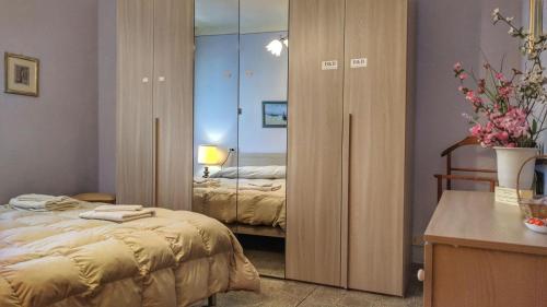 Tempat tidur dalam kamar di B&B Il Casale delle Pianacce